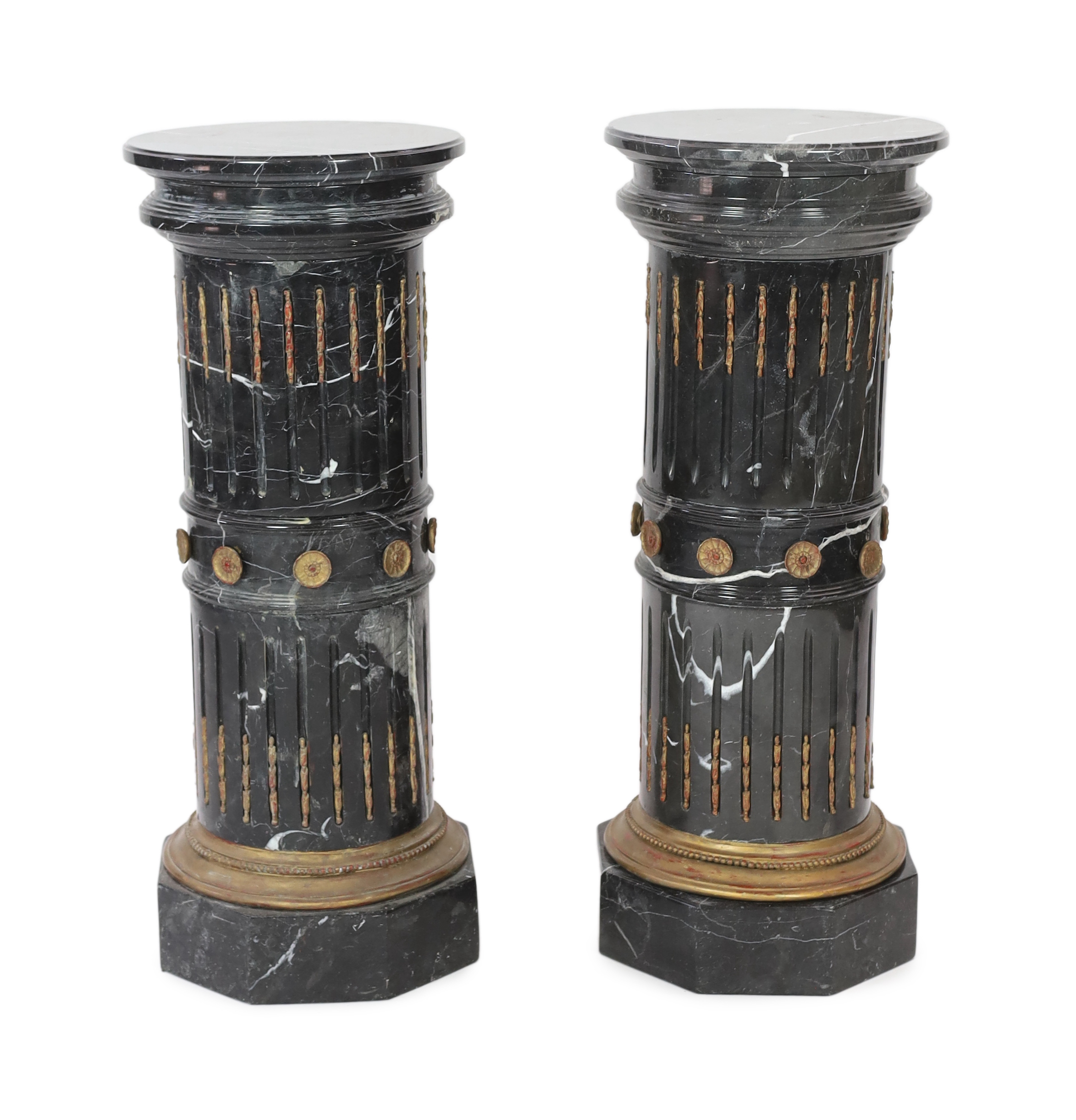 A pair of ornate variegated green marble columns, diameter 41cm, height 102cm